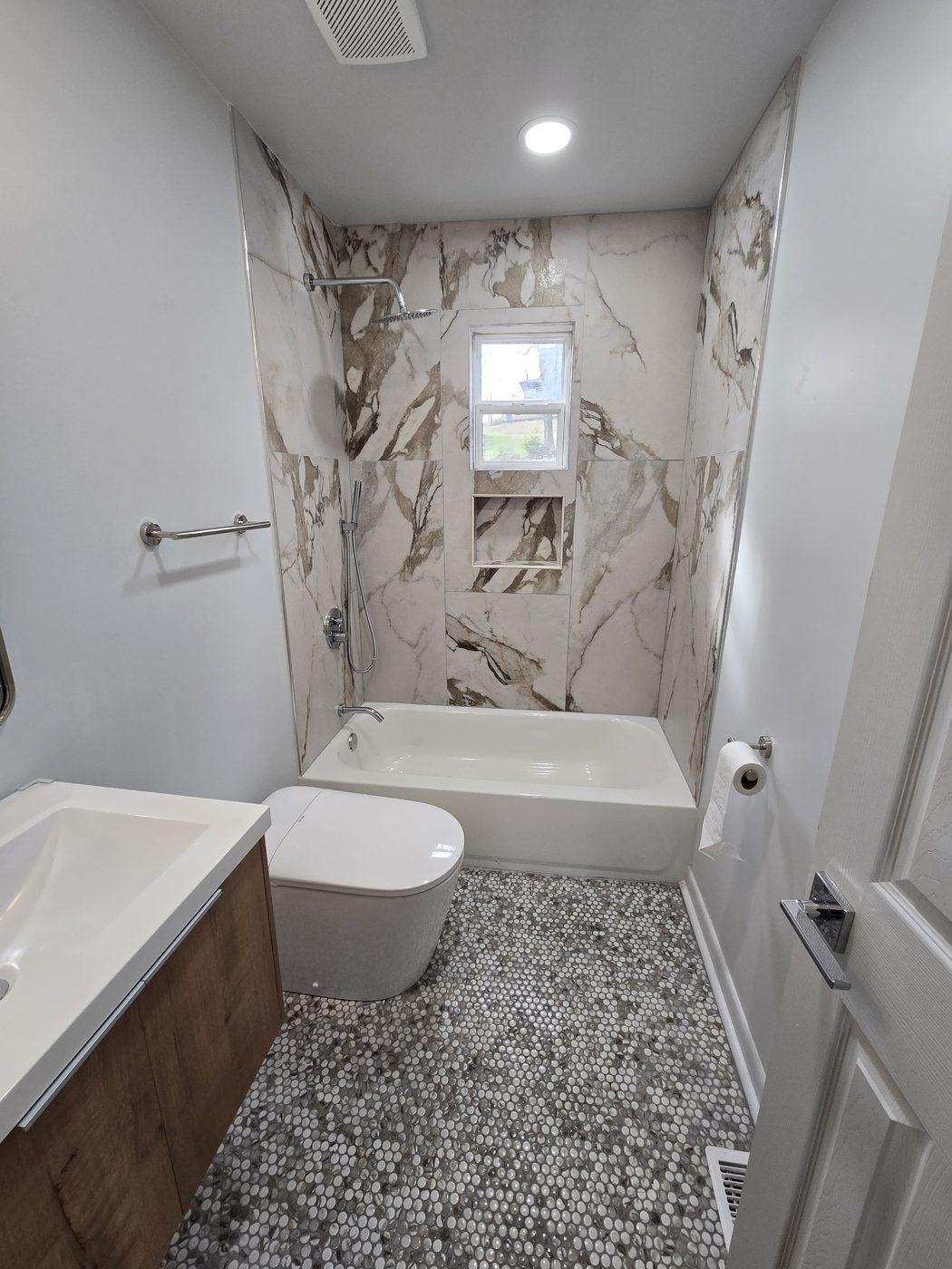 Detailed bathroom clean with polished chrome fixtures by Kidoti Clean investor and rehab cleaning in Birmingham AL