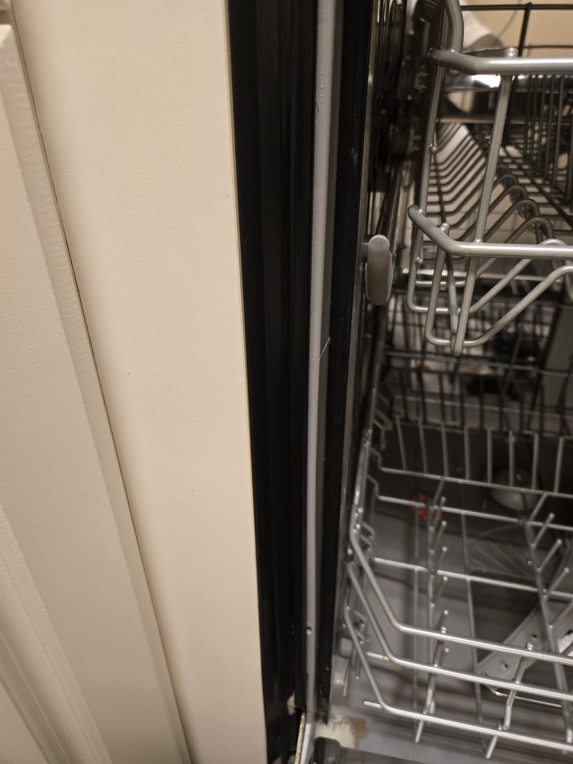 Dishwasher door seal cleaned after Kidoti Clean rehab cleaning, Birmingham AL