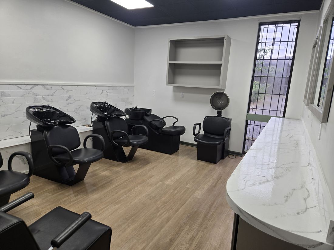 Clean salon shampoo area with shampoo chairs, hood dryer and counter after Kidoti Clean post-construction cleaning, Birmingham AL