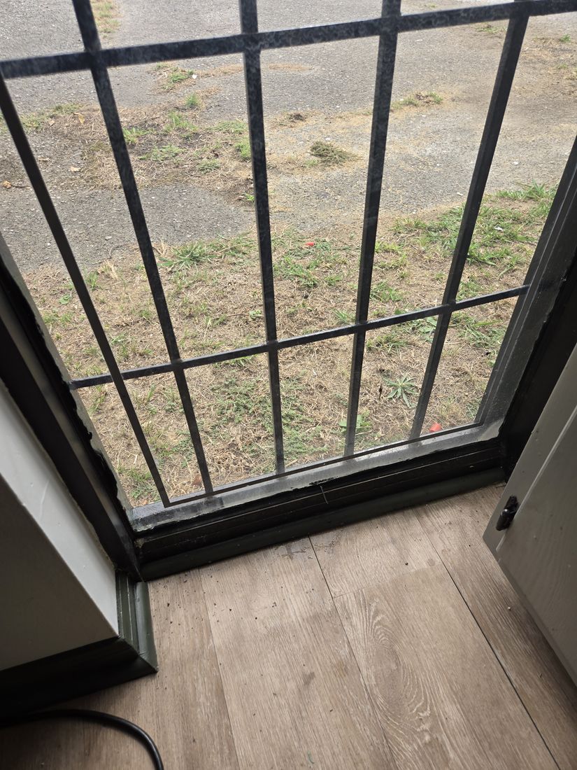 Same salon window with clear glass after Kidoti Clean post-construction cleaning, Birmingham AL